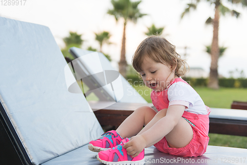 Image of little cute girl enjoying summer vacations