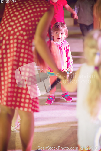 Image of little girl dancing in the kids disco