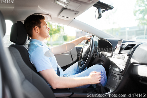 Image of man or driver driving car in summer