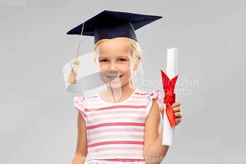 Image of little girl in mortarboard with diploma