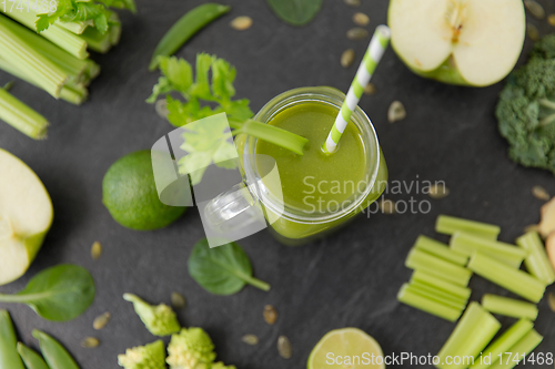 Image of close up of glass mug with green vegetable juice