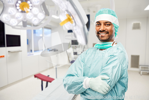 Image of smiling indian male doctor or surgeon at hospital