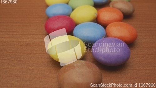 Image of Colorful chocolate confectionery in camera motion