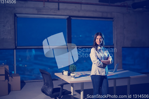 Image of young female architect and engineer on construction site