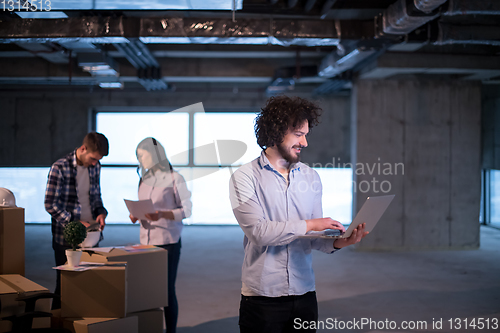 Image of young male architect and engineer on construction site