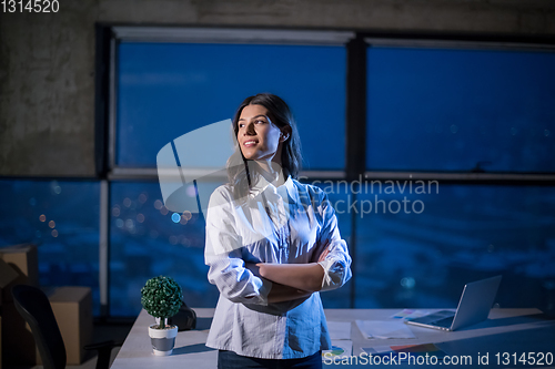 Image of young female architect and engineer on construction site