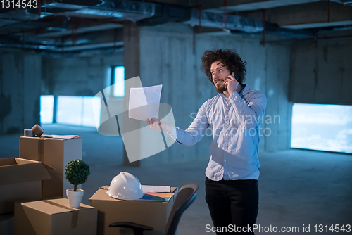 Image of man architect on construction site