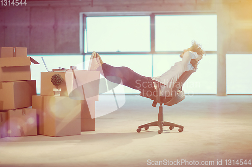 Image of young business man taking a break on construction site