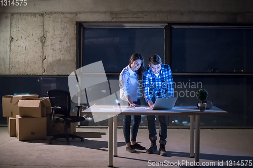 Image of business people on construction site  in new startup office at n