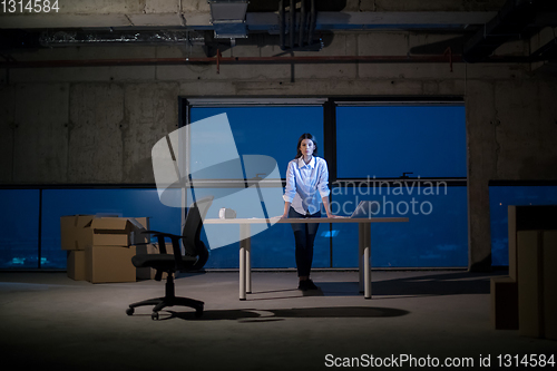 Image of young female architect and engineer on construction site