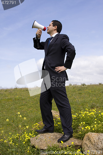 Image of Businessman speaking with a megaphone