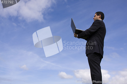 Image of Businessman with a laptop