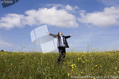 Image of businessman enjoying nature