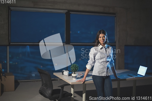 Image of young female architect and engineer on construction site