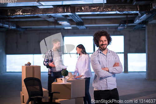 Image of young businessman on construction site