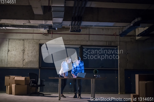 Image of business people on construction site  in new startup office at n