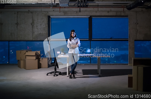 Image of young female architect and engineer on construction site