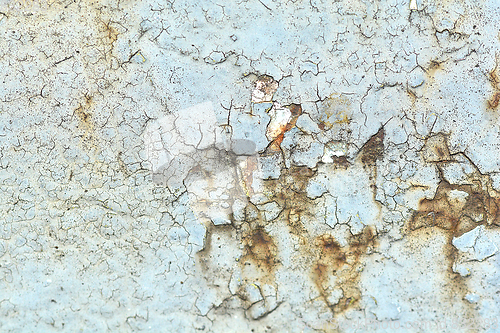 Image of Green metal texture with patches of rust steel on its surface, taken outdoor