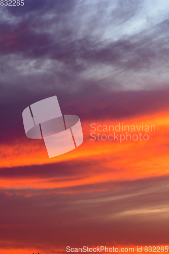 Image of Dramatic sky at sunset with red, yellow and orange colors.