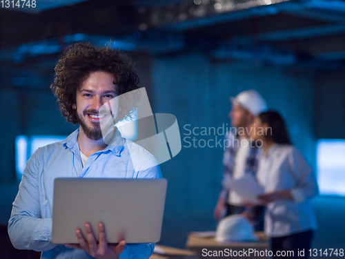 Image of young engineer on construction site