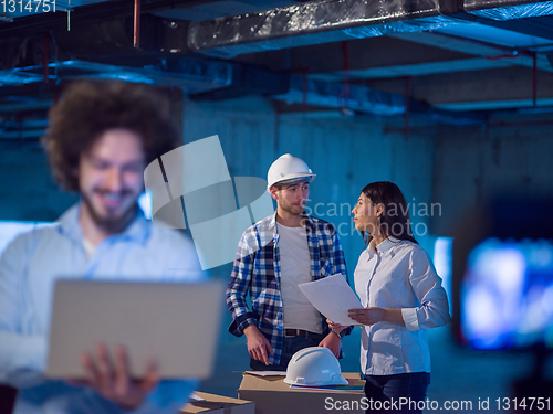 Image of young engineer on construction site