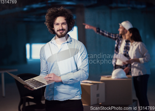 Image of young engineer on construction site