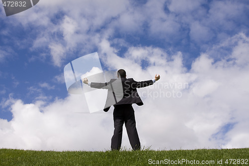 Image of businessman looking to the future