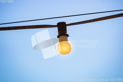 Image of old light bulb outside