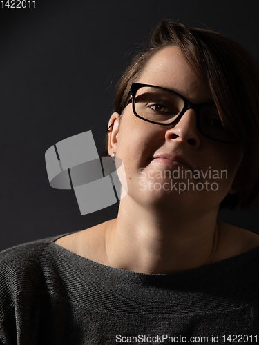 Image of young woman with glasses portrait