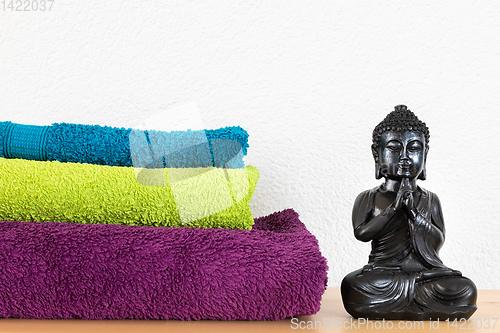 Image of Buddha and towels background