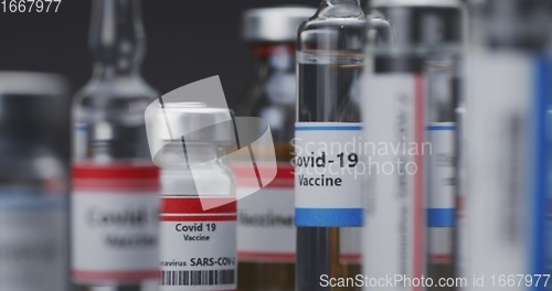 Image of Vaccine for virus in small bottles