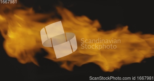 Image of Fire bursting against dark background 120 fps slow motion footage