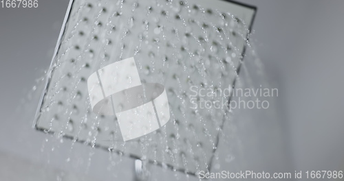 Image of Water flowing from shower head 120 fps slow motion closeup footage