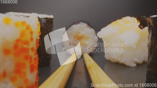 Image of Sushi on the plate with camera motion macro footage