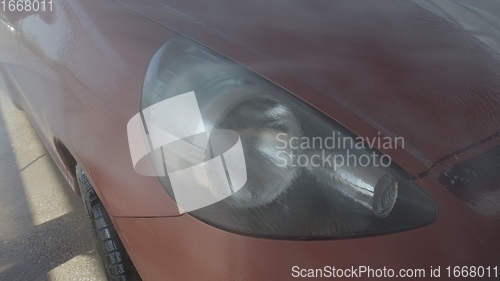 Image of Eashing dirty car closeup footage