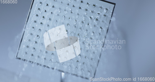 Image of Water flowing from shower head 120 fps slow motion closeup footage