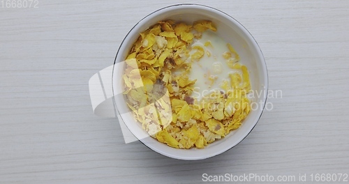 Image of Eating bowl of cereals for breakfast