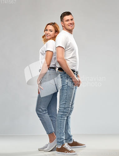 Image of portrait of happy couple in white t-shirts