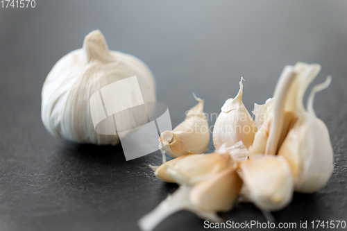 Image of garlic on slate stone background