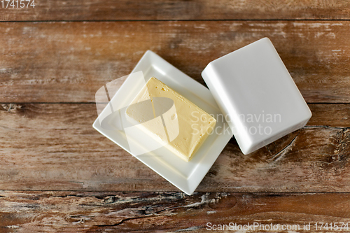 Image of close up of butter on wooden table