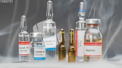 Image of Vaccine for virus in small bottles