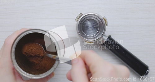 Image of Preparing coffee for the machine
