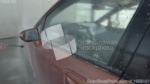 Image of Eashing dirty car closeup footage