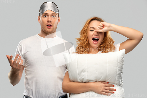 Image of couple with eye sleeping mask and pillow