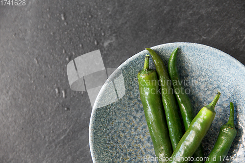 Image of close up of green chili peppers in bowl