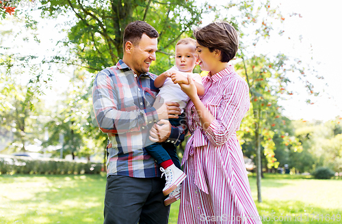 Image of happy family at summer park