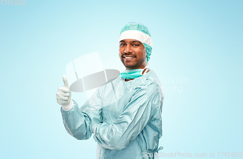 Image of indian male doctor or surgeon showing thumbs up