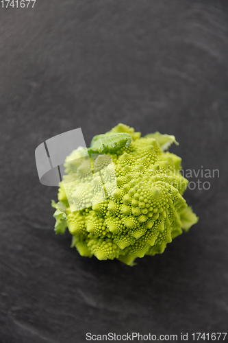 Image of close up of romanesco broccoli on slate stone