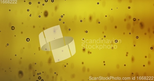 Image of Texture of beer as background slow motion footage