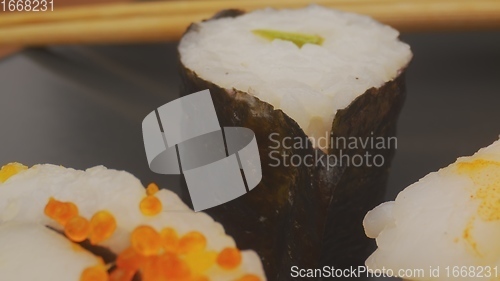 Image of Sushi on the plate with camera motion macro footage